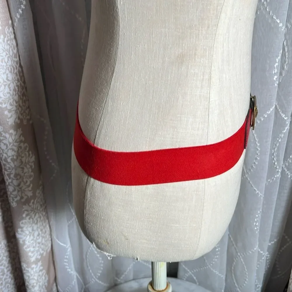 VINTAGE Anne Klein red stretch belt with gold buckle.